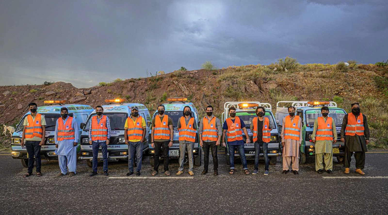 The CDRS Benji rescue team with the ambulance fleet
